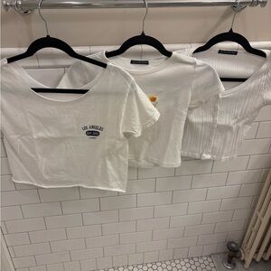 Brandy Melville set of three white tops.
